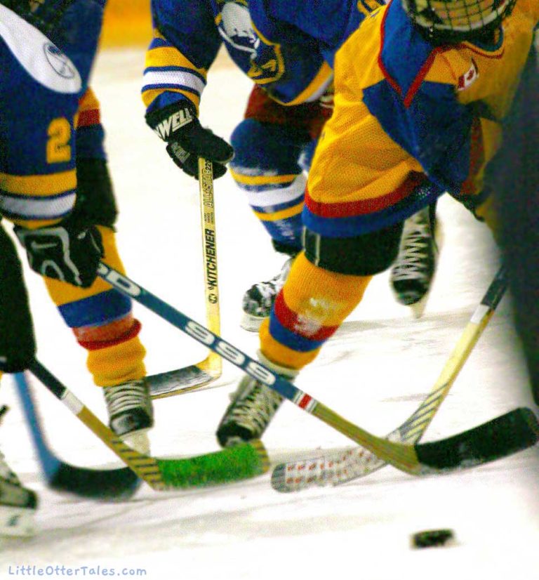 boys ice hockey - a jumble of sticks and skates