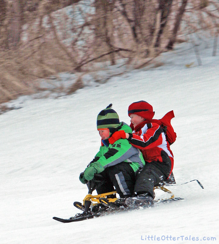 boys sledding