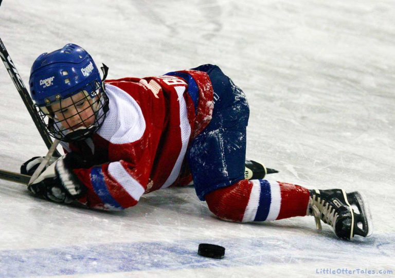 toe the line - boy playing hockey staying onside