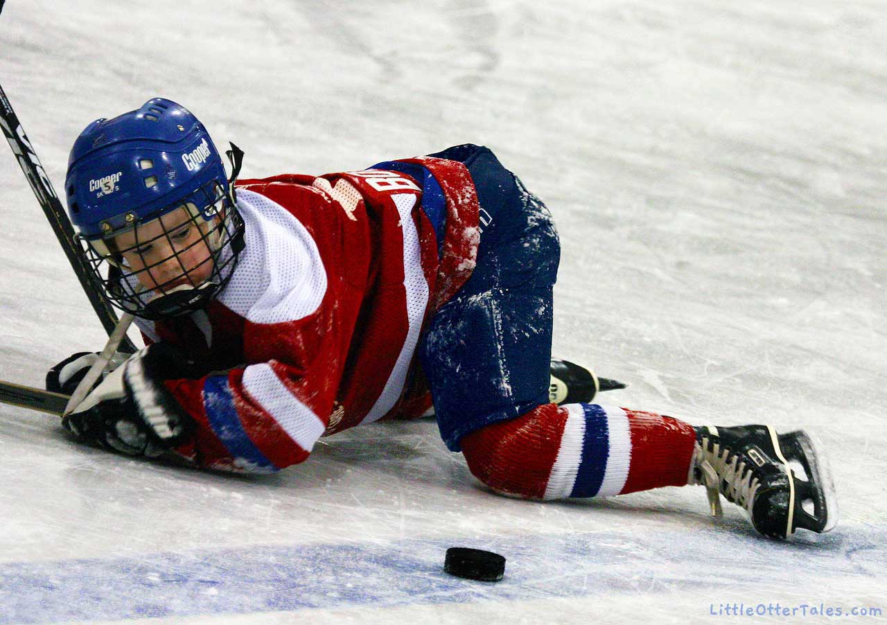 toe the line - boy playing hockey staying onside